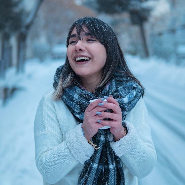 Aanya Kapoor, Lead Design Curator at Dawn Ridge Atelier, reviewing corporate floral arrangements